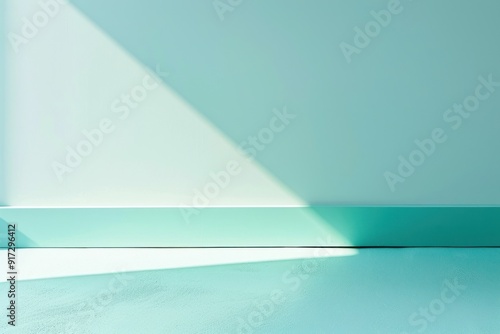 Light Casting a Shadow on a Teal Wall and Floor