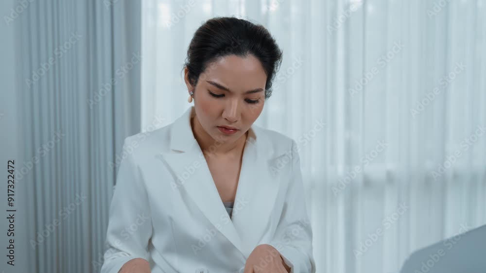 Stressful businesswoman looking at debt bill invoice notification, faces bankruptcy due to overwhelming debt, expenses and economic crisis from bad corporate financial and loan pay management. Vivancy