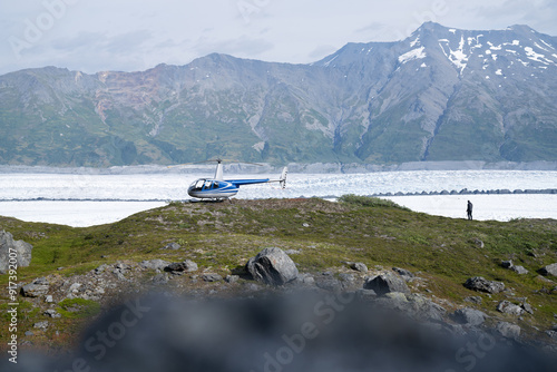 Helicopter landed near beautiful glacier landscape in Alaska, USA