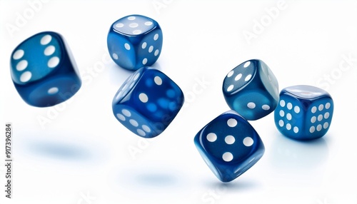 four blue dice flying randomly in the air on a white background isolated photo