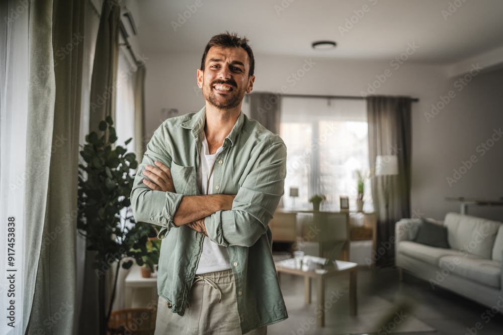 Portrait of adult man stand and smile at home Portrait of adult man stand and smile at home