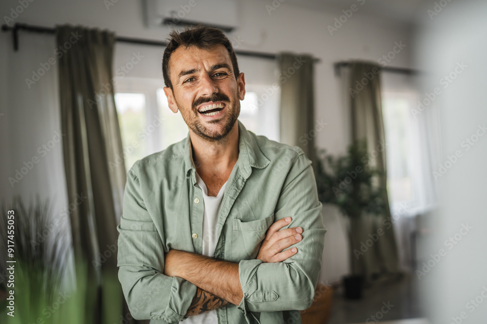 Portrait of adult man stand and smile at home Portrait of adult man stand and smile at home