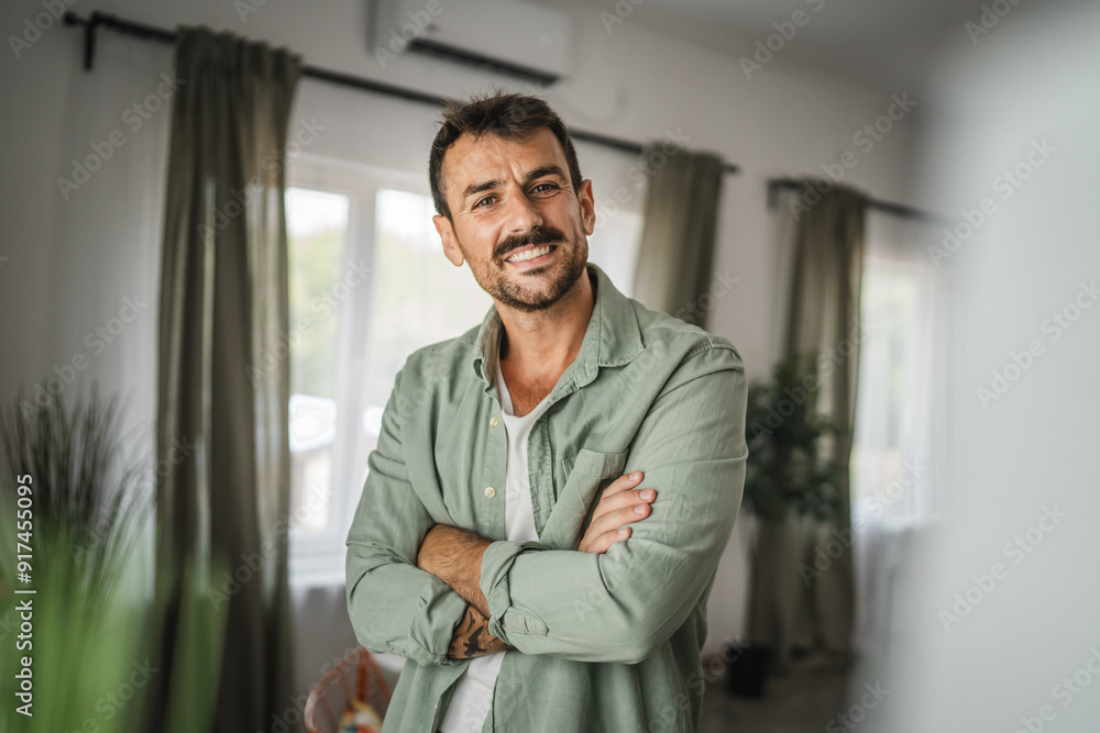 Portrait of adult man stand and smile at home Portrait of adult man stand and smile at home