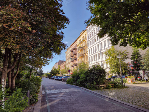 Beautiful renovated pre-WWII residential buildings in a quiet street in Prenzlauer Berg neighbourhood in Berlin, Germany