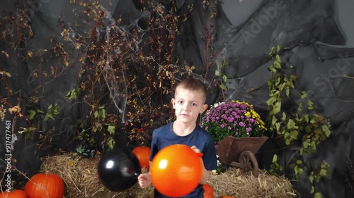 portreit happy children preparing for Halloween. child with halloween pumpkin. photo