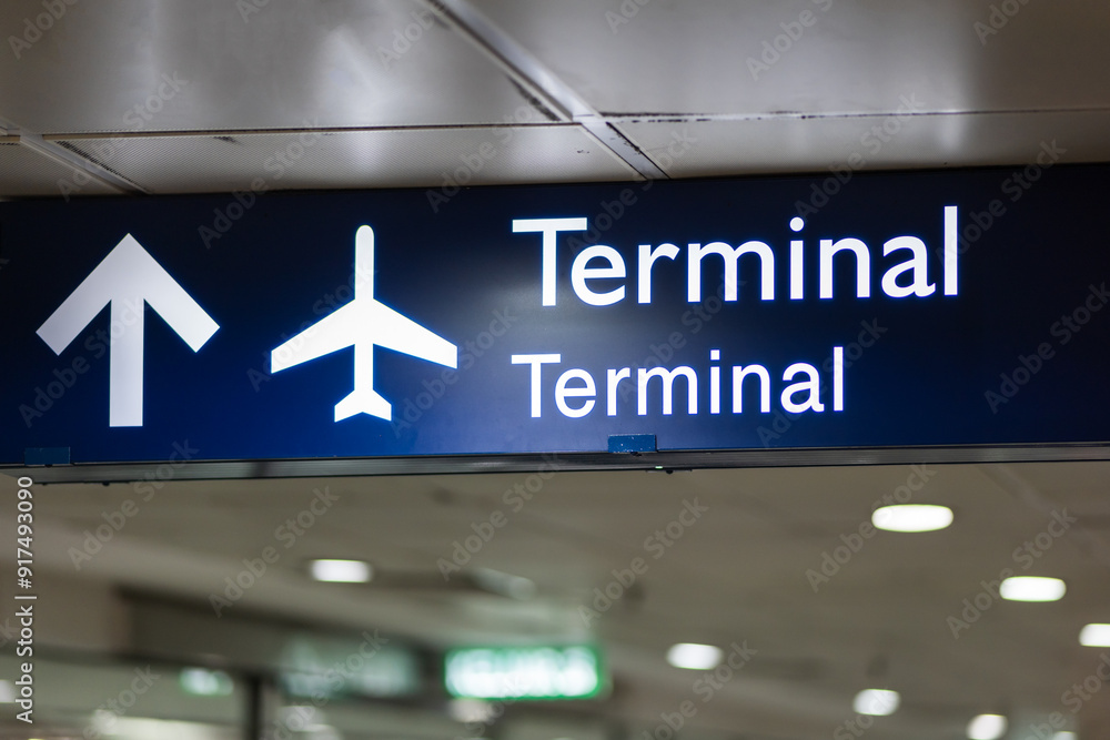 Airport sign showing the way to the airport terminal building. Airport sign showing the way to the airport terminal building.