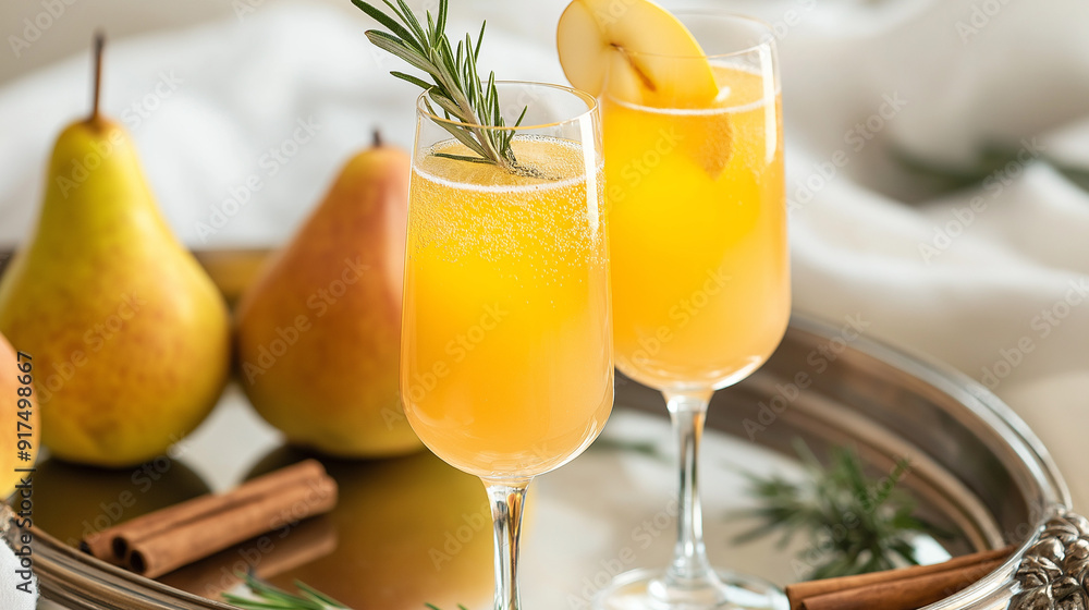 A champagne flute filled with a gradient of golden pear puree and sparkling wine, creating a beautiful ombré effect A champagne flute filled with a gradient of golden pear puree and sparkling wine, creating a beautiful ombré effect