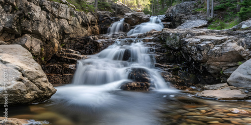 Waterfall cascading down rocky cliffs