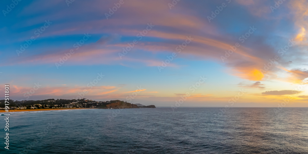 Sunrise Seascape Panorama with Lenticular cloud Sunrise Seascape Panorama with Lenticular cloud