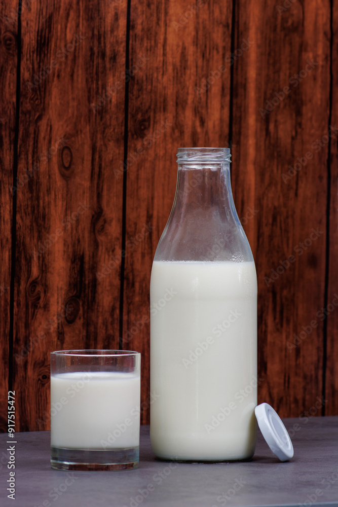 bottle of milk and a glass of milk bottle of milk and a glass of milk