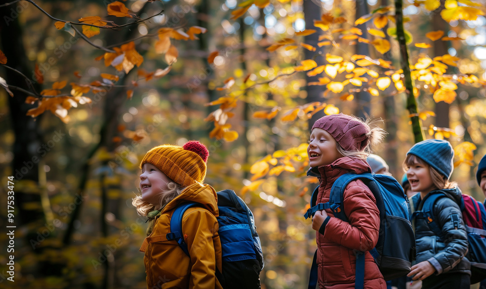 children about 5 are hiking in the autumn forest, they are smiling children about 5 are hiking in the autumn forest, they are smiling