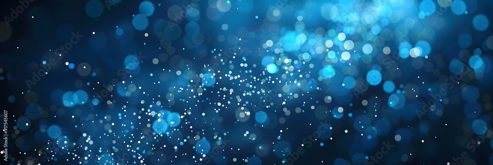 Blue winter night bokeh with water drops, twinkling lights, and shimmering glitter particles Blue winter night bokeh with water drops, twinkling lights, and shimmering glitter particles