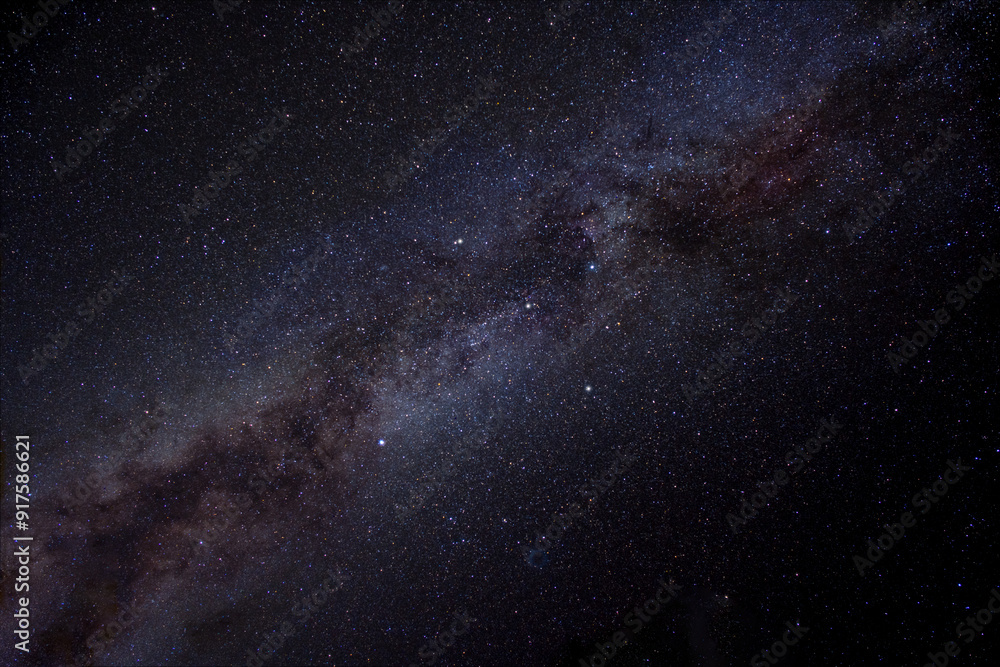 Fototapeta premium The Northern Cross and Milky Way stars high in the night sky