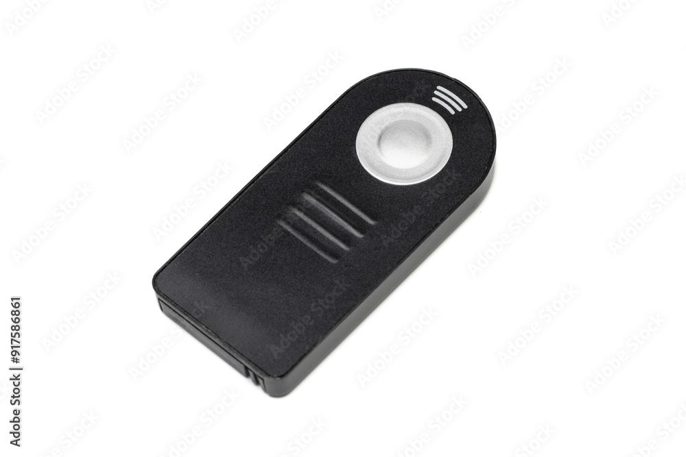 Wireless or infrared shutter release remote for camera. Isolated in white background. Wireless or infrared shutter release remote for camera. Isolated in white background.
