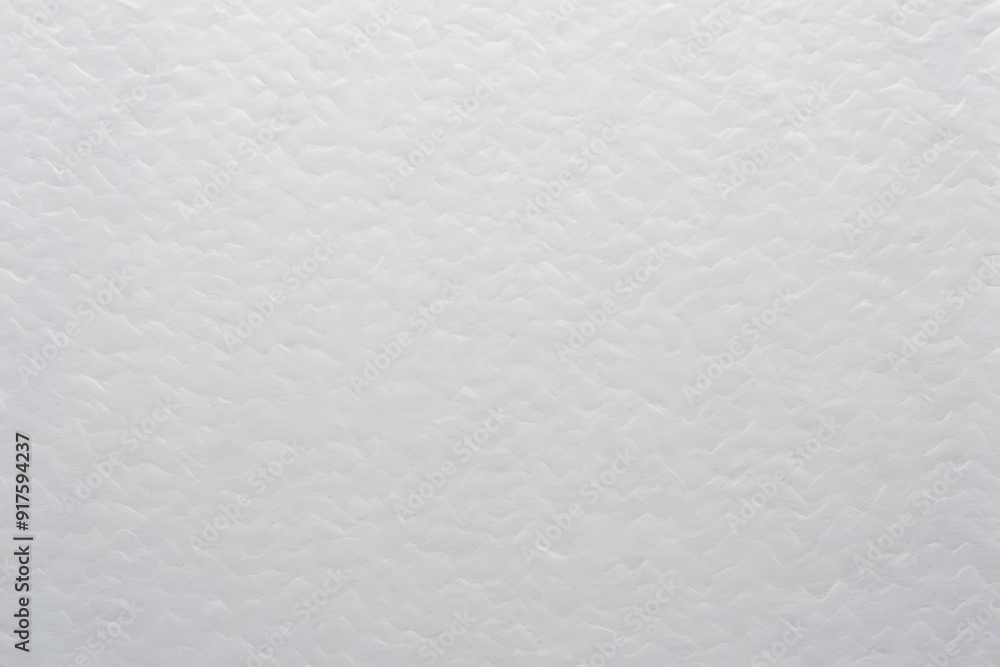 White textured background with subtle raised pattern. White textured background with subtle raised pattern.