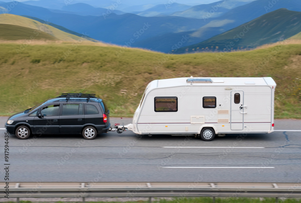 Obraz premium Family Car With RV Van in Mountainous Scenic Landscape.