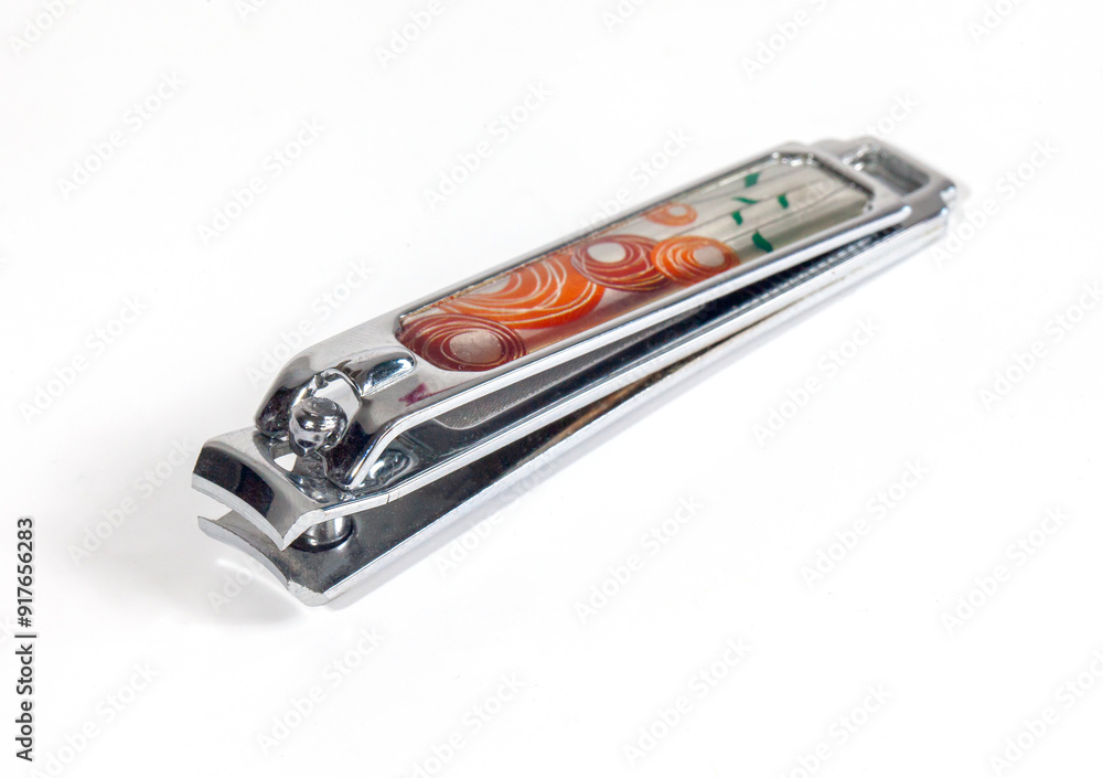 Silver nail clippers isolated on white background. Tools for manicure and pedicure care. Silver nail clippers isolated on white background. Tools for manicure and pedicure care.