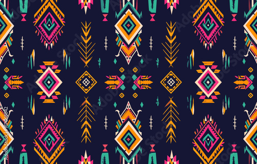 Seamless tribal pattern with geometric shapes and a dark blue background This vibrant design features colorful diamonds arrows and abstract elements It is ideal for use in textile design wallpaper and