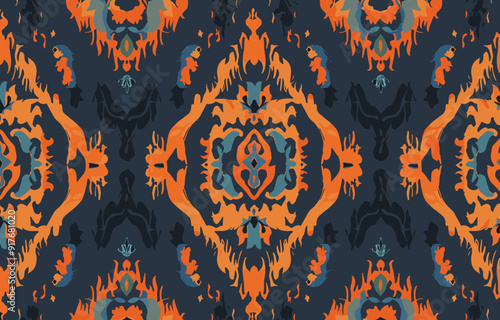 Intricate symmetrical pattern with a blue, orange, and black color scheme. It features abstract floral shapes with a vintage, textile feel.