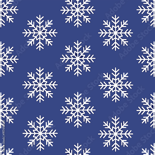 Seamless pattern with white snowflakes on a blue background, ideal for winter holiday or Christmas themed projects.