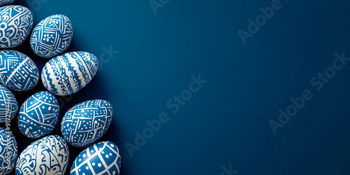 r blue eggs with white patterns on a dark background
