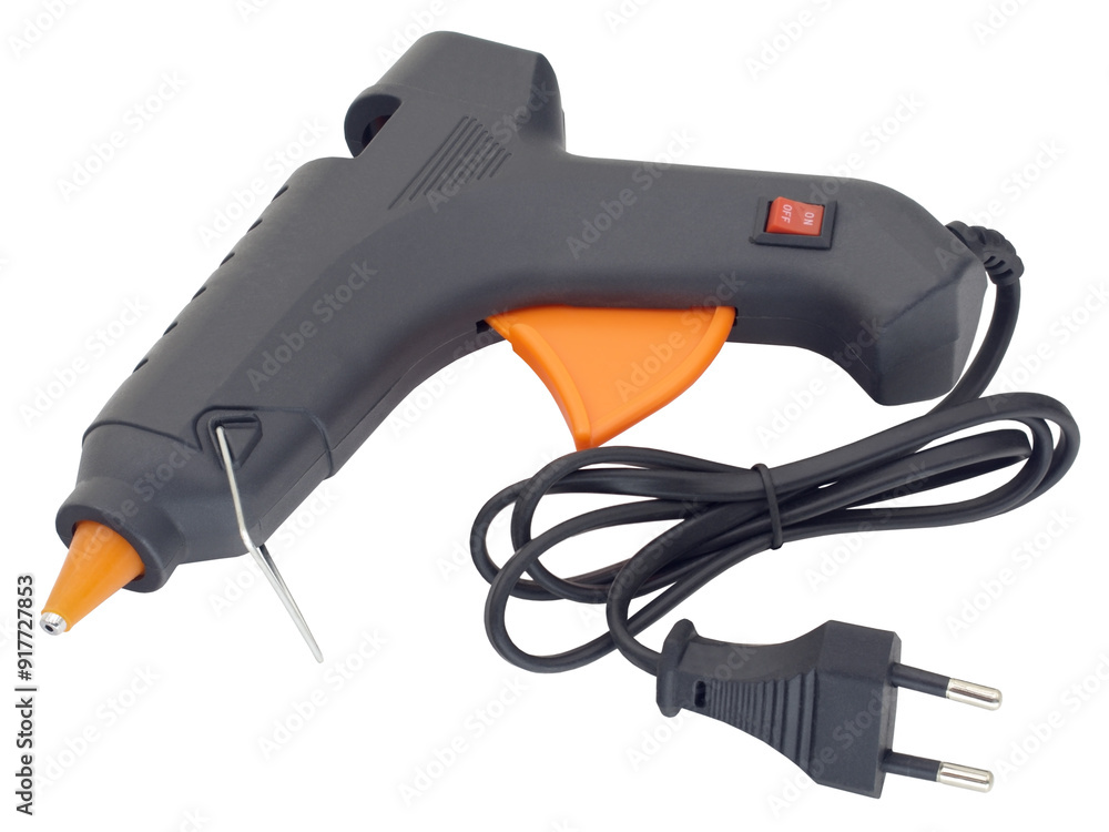 Electric hot glue gun isolated on white Electric hot glue gun isolated on white