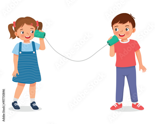 cute little kids playing handcrafted wired string telephone talking to each others