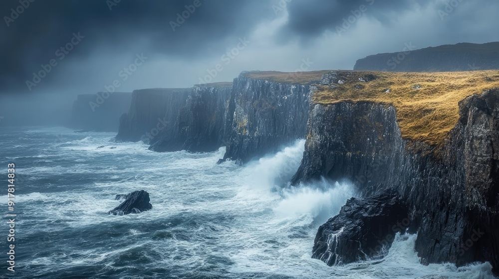 Rugged coastline with dramatic cliffs and crashing waves under a stormy sky Rugged coastline with dramatic cliffs and crashing waves under a stormy sky