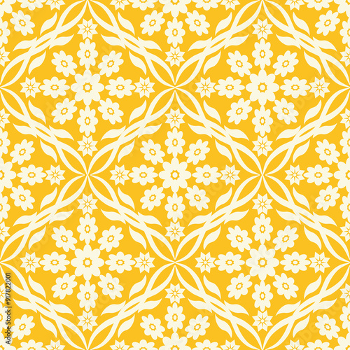 Yellow floral ethnic motif seamless pattern for wallpaper, wrapping and textile.