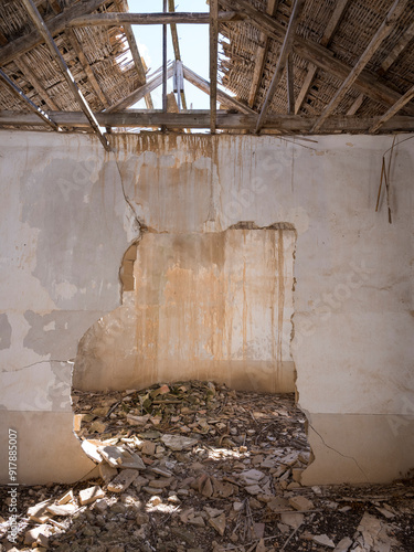 Decaying interior of an abandoned building photo