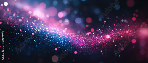 A blurry image of a purple and blue swirl of glitter