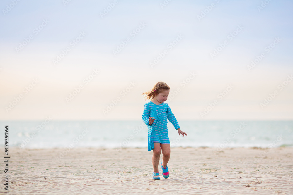 Kids playing on beach. Children play at sea. Kids playing on beach. Children play at sea.