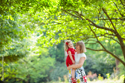 Portrait of happy woman with kids