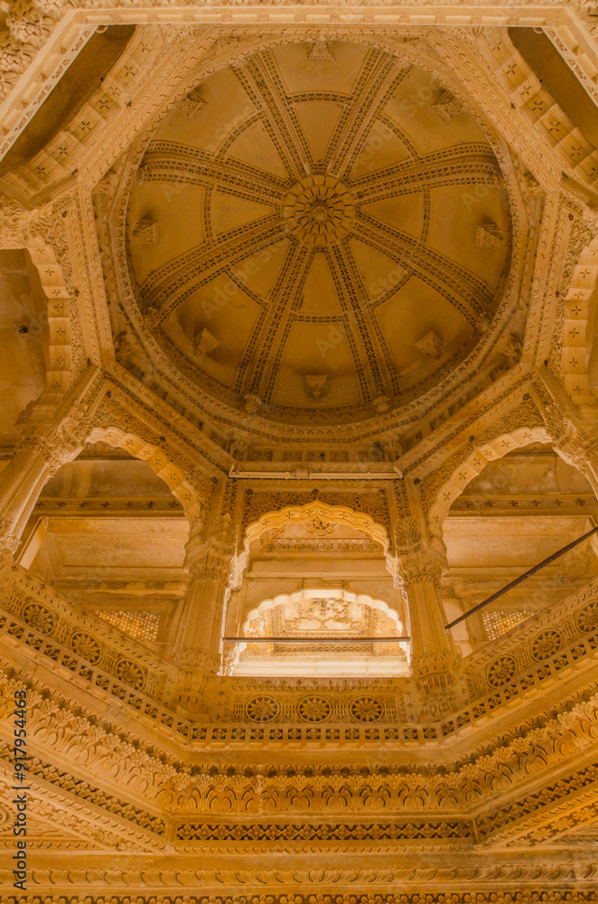 Fototapeta premium Amar Sagar Jain temple, ancient architecture, 12th century, Details of delicate stone carvings, The intricate stonework, Jaisalmer, Rajasthan, India, Asia.