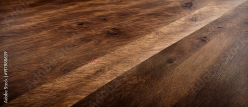 Walnut Wood Grain Texture: A captivating close-up of rich walnut wood grain, showcasing the intricate patterns, natural knots, and warm tones of this luxurious wood. Perfect for creating a sense of wa