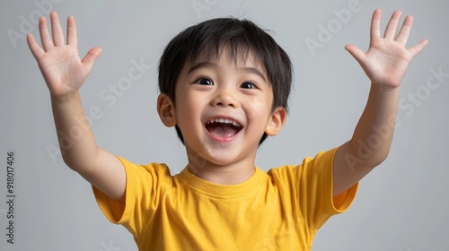 Excited Asian Boy Looking Forward with Raised Hands Generative AI