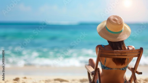 Relaxing Woman in Straw Hat by the Turquoise Ocean at a Tropical Beach