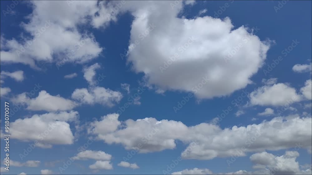 Beautiful white cumulus clouds in the sky at midday Beautiful white cumulus clouds in the sky at midday