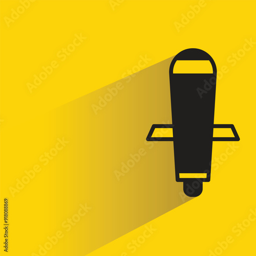 missile icon with shadow on yellow background