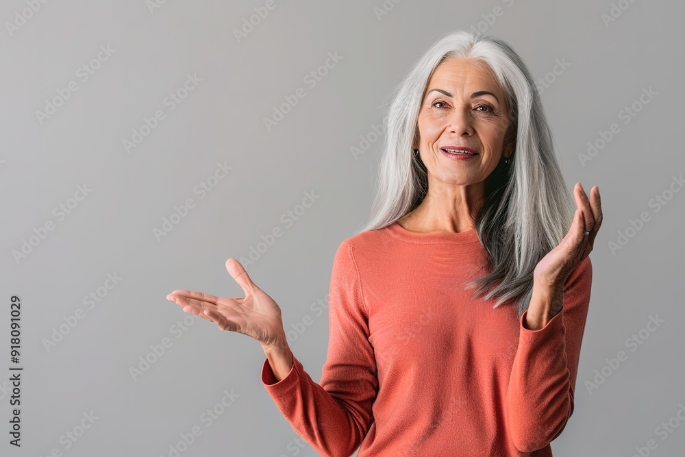 Smiling senior woman gesturing with hands Smiling senior woman gesturing with hands