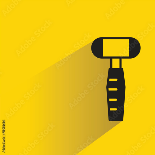 hammer tool icon with shadow on yellow background