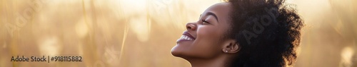 Joyful Young African American Woman in a Wheelchair Exuding Happiness and Independence - A Celebration of Diversity, Inclusion, and Divine Gratitude.