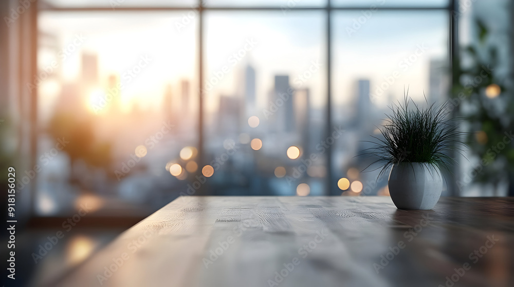 Wooden table with plant pot against city window. Wooden table with plant pot against city window.