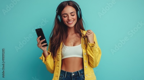 The cheerful woman with headphones photo