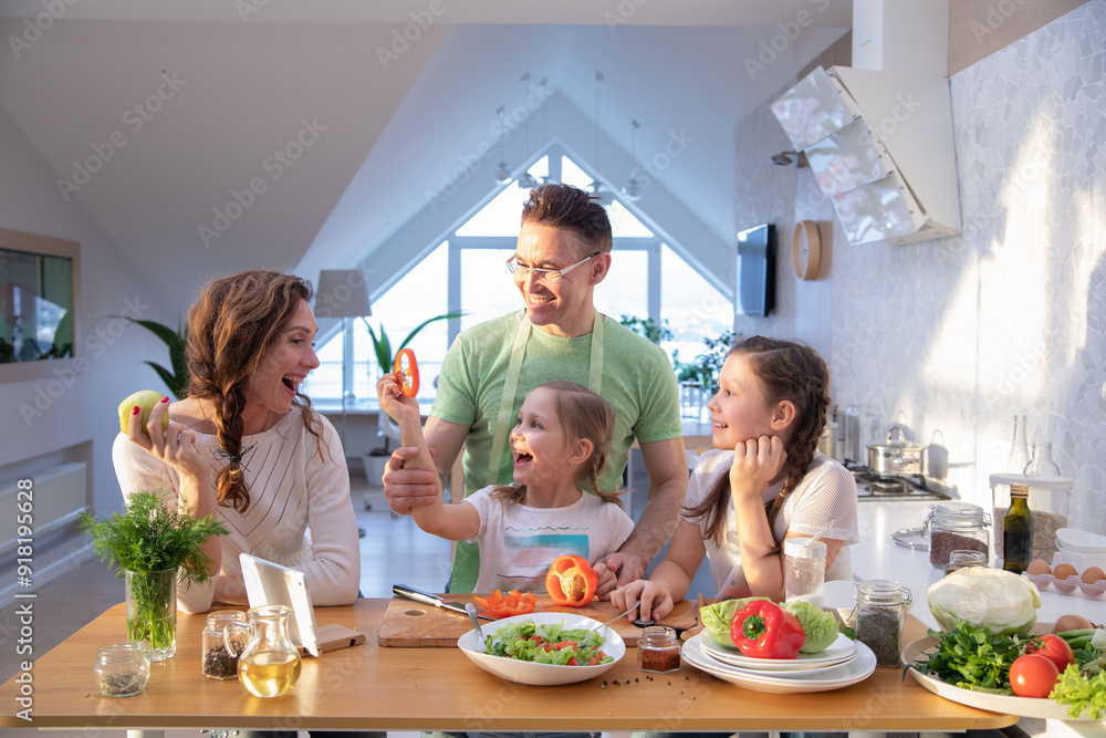 Family cooking in the kitchen at home