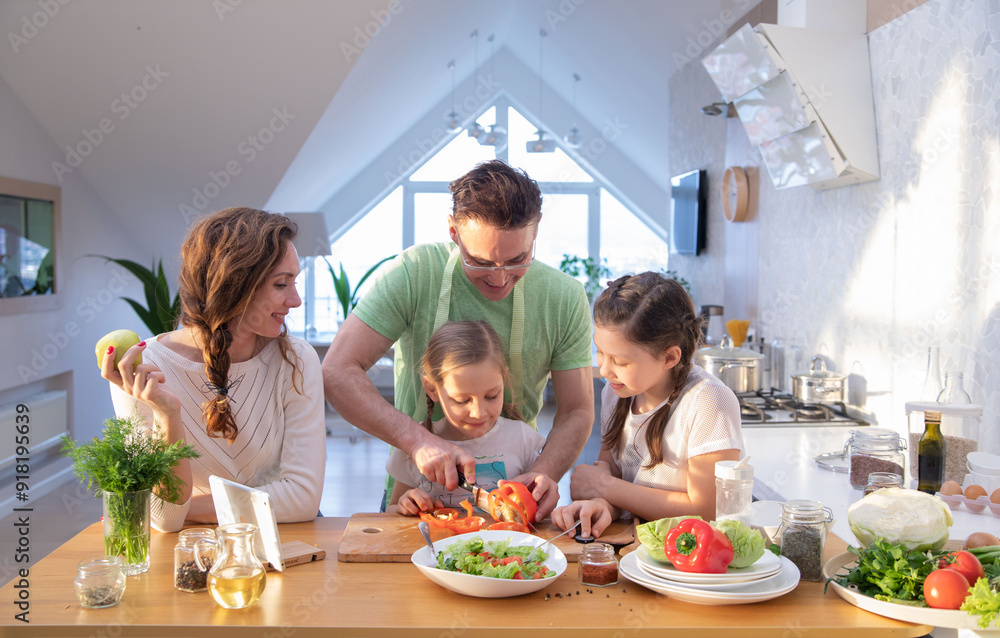 Family cooking in the kitchen at home