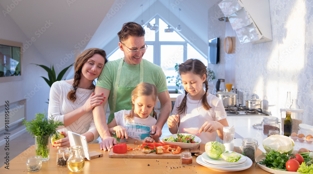 Family cooking in the kitchen at home