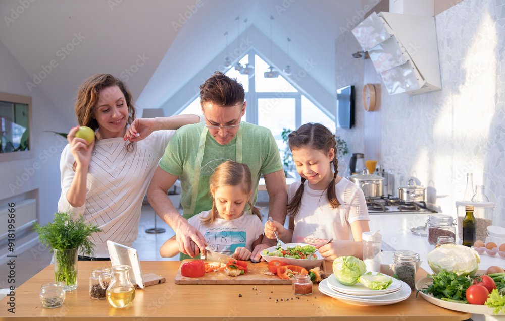 Family cooking in the kitchen at home
