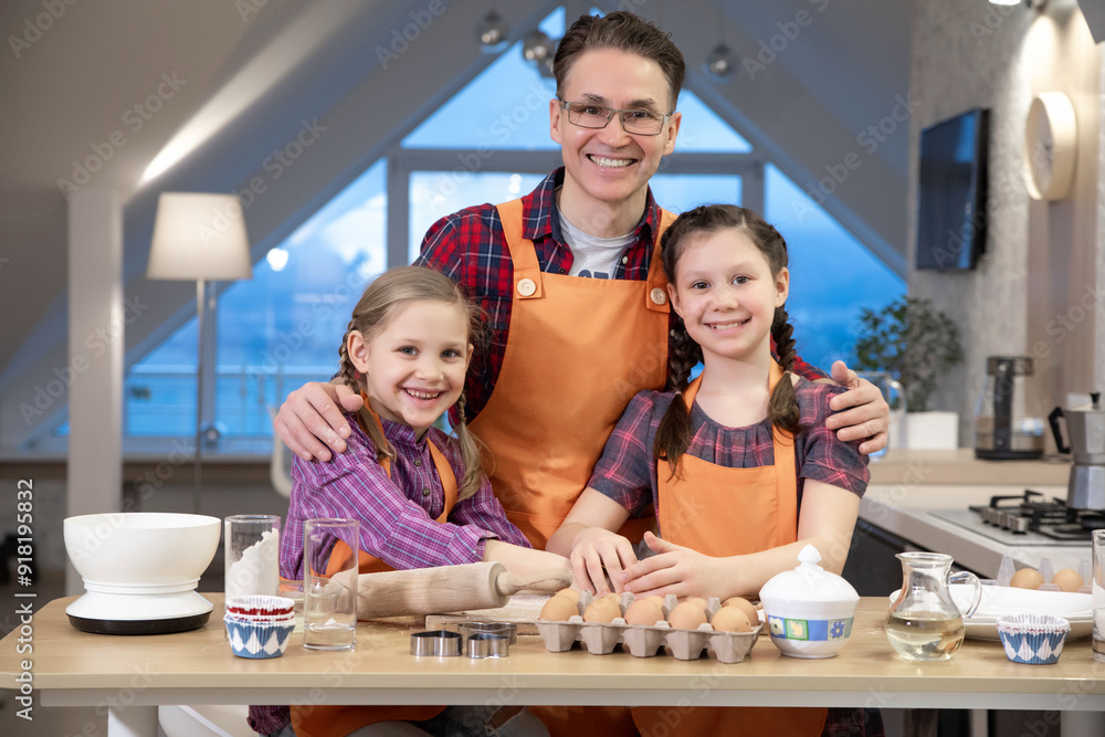 Family cooking in the kitchen at home