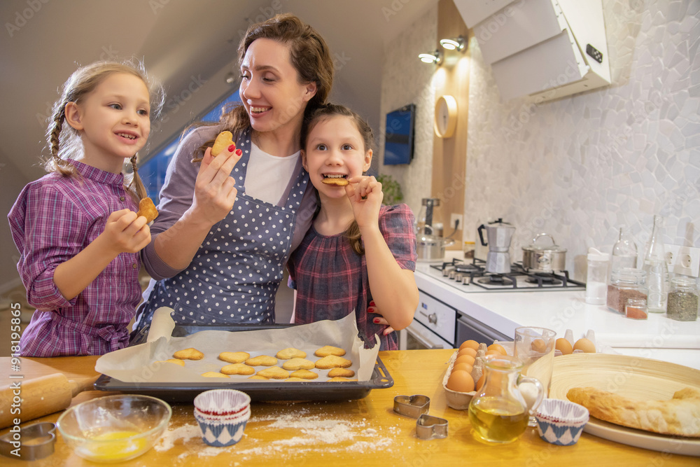 Family cooking in the kitchen at home